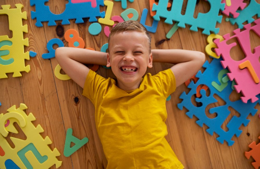 boy-playing-with-brain-teaser-toys